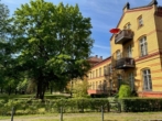 Hausansicht - Lichtdurchflutete attraktive 2 Zimmerwohnung