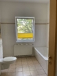 Badezimmer - Schöne 3-Zimmer-Wohnung im gemütlichen Mehrfamilienhaus, optional mit Gartenanteil