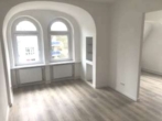 Wohnzimmer - Helle 3 Zimmerwohnung mit Balkon und Gartennutzung
