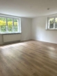 Wohnzimmer - Attraktive 1 Zimmerwohnung mit großer separater Wohnküche und Terrasse