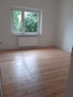 Wohnzimmer - Großzügige 3 Zimmerwohnung direkt am Kanal
