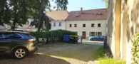 Hausansicht Hof - Attraktive 2-Zimmerwohnung zzgl. kleinem Arbeitszimmer – wenige Schritte zum Straussee