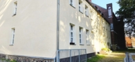 Hausansicht Hof - Attraktive 2-Zimmerwohnung zzgl. kleinem Arbeitszimmer – wenige Schritte zum Straussee