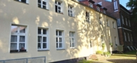 Hausansicht Hof - Attraktive 2-Zimmerwohnung zzgl. kleinem Arbeitszimmer – wenige Schritte zum Straussee