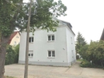Hausansicht - Großzügige 4 Zimmerwohnung mit Gemeinschaftsgarten