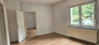 Wohnzimmer - Großzügige 4 Zimmerwohnung mit Gemeinschaftsgarten