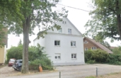 Hausansicht - Großzügige 4 Zimmerwohnung mit Gemeinschaftsgarten