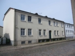 Hausansicht - 2 Zimmerwohnung mit großem Gemeinschaftsgarten
