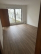 Wohnzimmer - 2 Zimmerwohnung mit großem Gemeinschaftsgarten